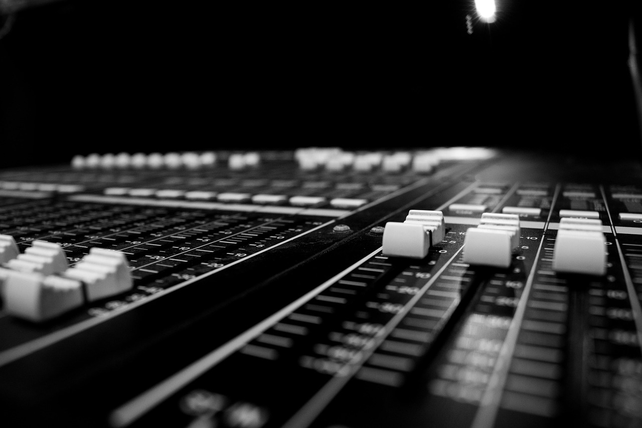 Mixing console faders in black and white