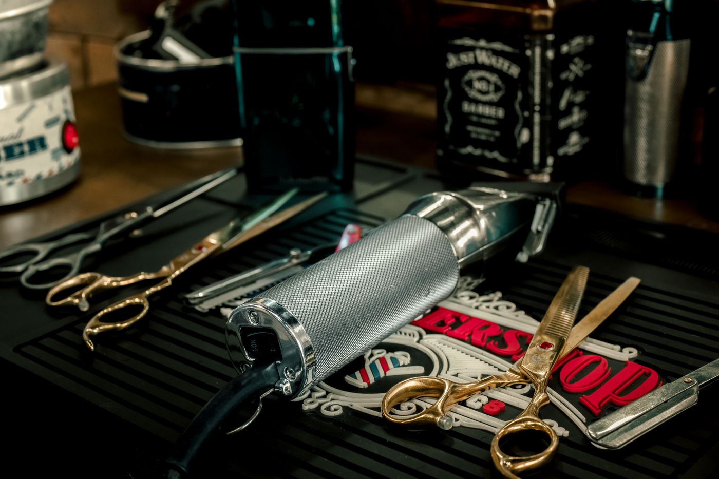 Scissors and razors on the counter of a barber shop