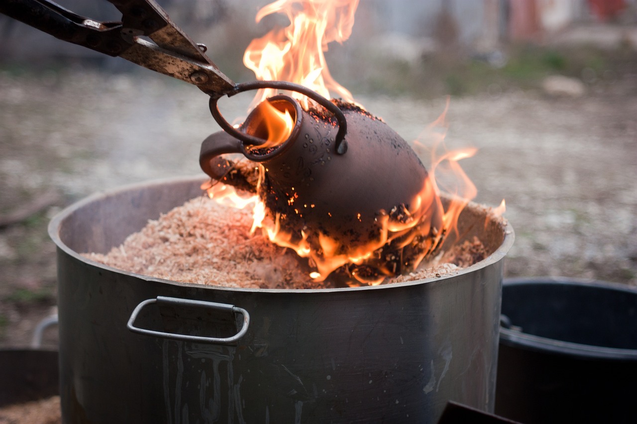 A vessel pulled flaming from a raku barrel