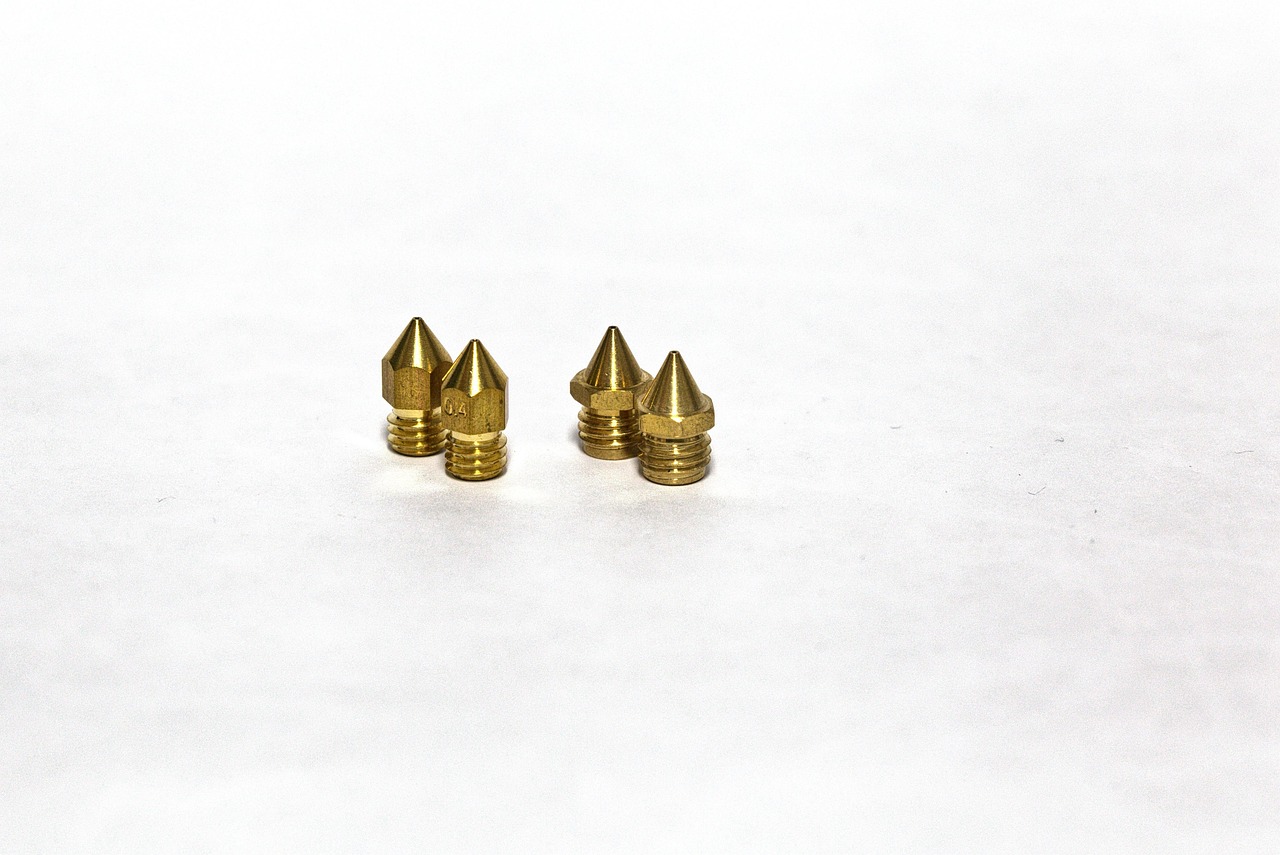 Brass precision nozzles on white