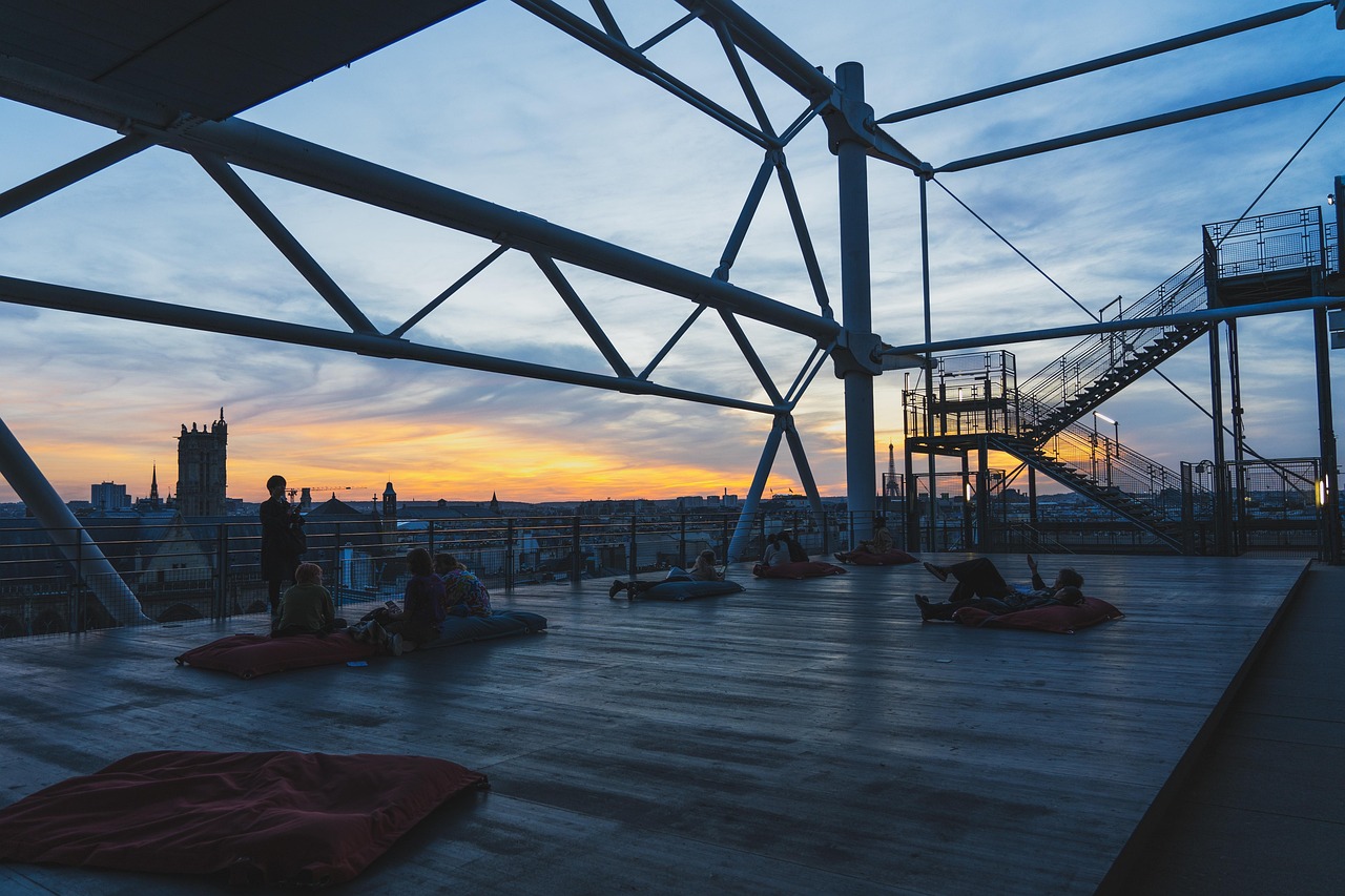 The roof deck at dusk with loungers